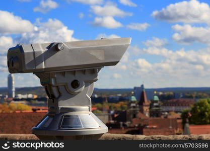 Telescope in the Nuremberg castle, view of the city, church, sky, clouds&#xA;