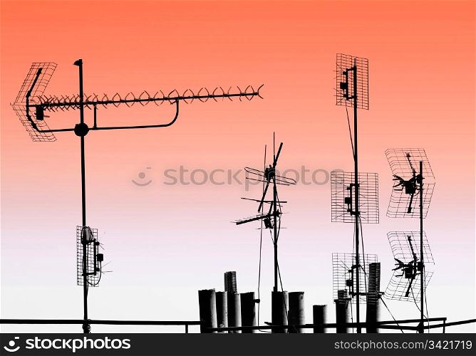 television antennas and pipes on the rooftop