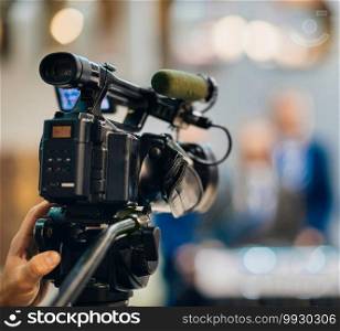 Television camera recording publicity event
