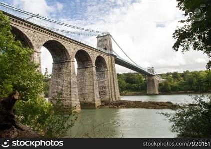 Telfords 1826 Suspension Bridge over the Menai Straits. Between Gwynedd and Anglesey, Wales, United Kingdom.
