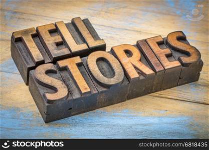 tell stories word abstract - text in vintage letterpress wood type - storytelling concept