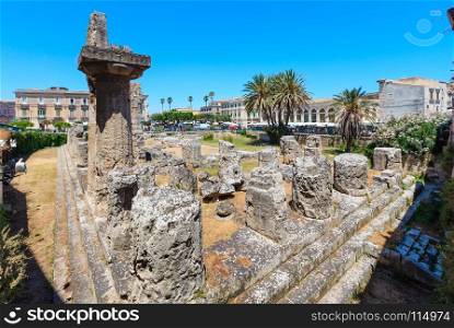 Tempio di Apollo ruins. Ortigia island at city of Syracuse, Sicily, Italy. Beautiful travel photo of Sicily. People are unrecognizable.