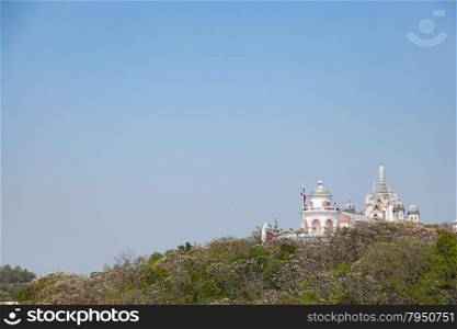 Temple and Pagoda on the high peaks. With trees A clear sky