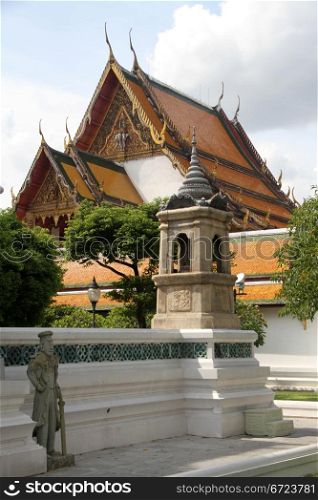 Temple and statue in wat Suthat, Bangkok, Thailand