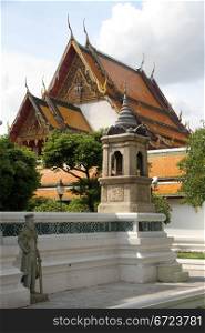 Temple and statue in wat Suthat, Bangkok, Thailand