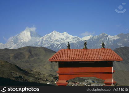 Temple in front of mountains, Muktinath, Annapurna Range, Himalayas, Nepal