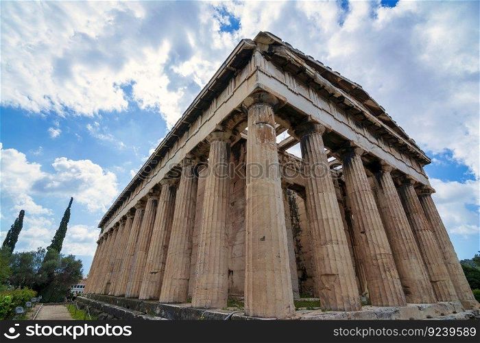 Temple of Hephaestus in Ancient Agora, Athens, Greece. The Temple of Hephaestus is the best preserved ancient temple in Greece. It was dedicated to Hephaestus, the ancient god of fire and Athena, goddess of pottery and crafts.. Temple of Hephaestus in Ancient Agora, Athens, Greece