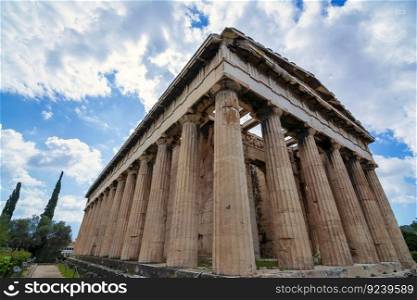 Temple of Hephaestus in Ancient Agora, Athens, Greece. The Temple of Hephaestus is the best preserved ancient temple in Greece. It was dedicated to Hephaestus, the ancient god of fire and Athena, goddess of pottery and crafts.. Temple of Hephaestus in Ancient Agora, Athens, Greece