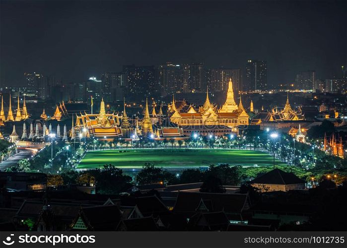 Temple of the Emerald Buddha, Grand palace, Wat Pho, Temple of Dawn, and Sanam Luang, Wat Phra Kaew, and skyscraper buildings. Bangkok City in downtown area at night, Thailand. Buddhist temple.