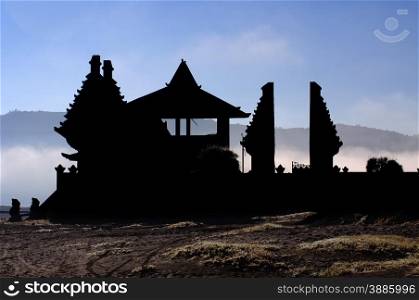 Temple silhouette at the foothills of the Bromo volcano,Tengger Semeru National Park, East Java, Indonesia