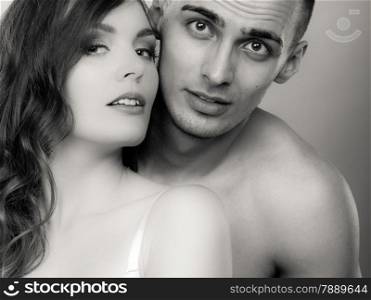 Temptation woman and man. Passionate young people in love. Couple in the passion. Black &amp; white photo