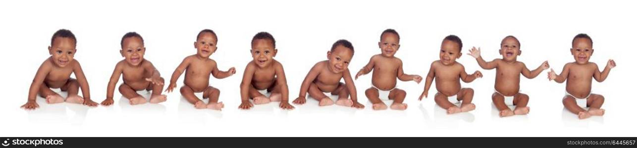 Ten funny african babies sitting on the floor isolated on white background