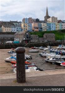 Tenby Wales Beach harbour town outside overcast cloudy day - Wales; UK