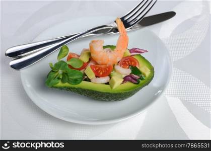 tender appetizer of avocado and shrimp with vegetables