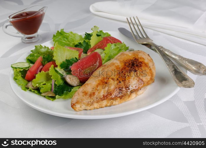 Tender chicken schnitzel with vegetable garnish