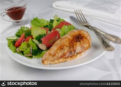 Tender chicken schnitzel with vegetable garnish