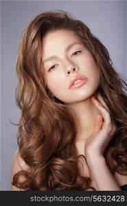 Tenderness. Young Woman with Long Healthy Loosing Hair