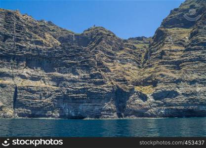 Tenerife blue ocean, big cliffs and beutiful nature. Blue sky and water. 2015 Travel photo.