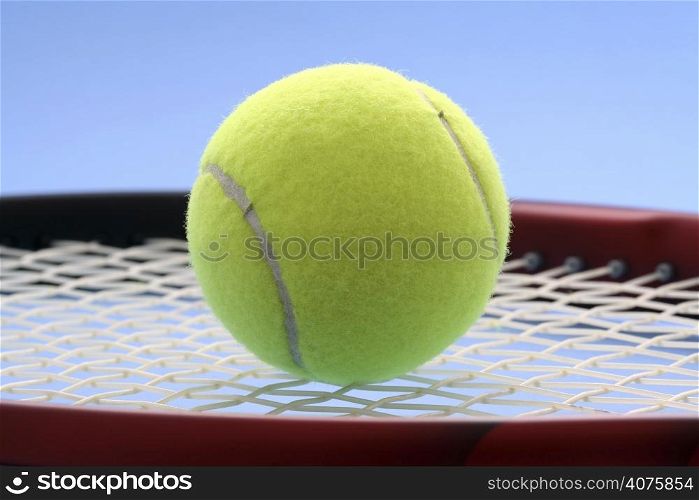 Tennis ball and tennis racquet