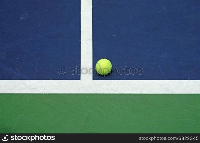 tennis ball at the corner of court