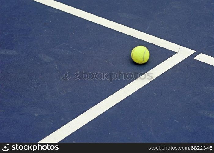 tennis ball at the corner of court