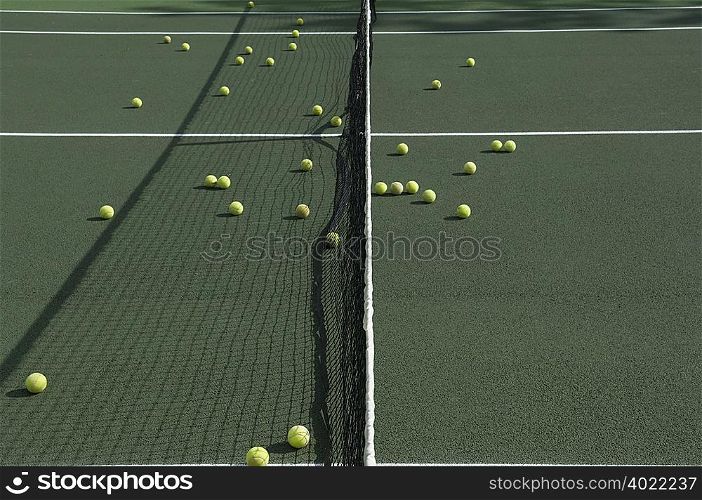 Tennis balls on tennis court