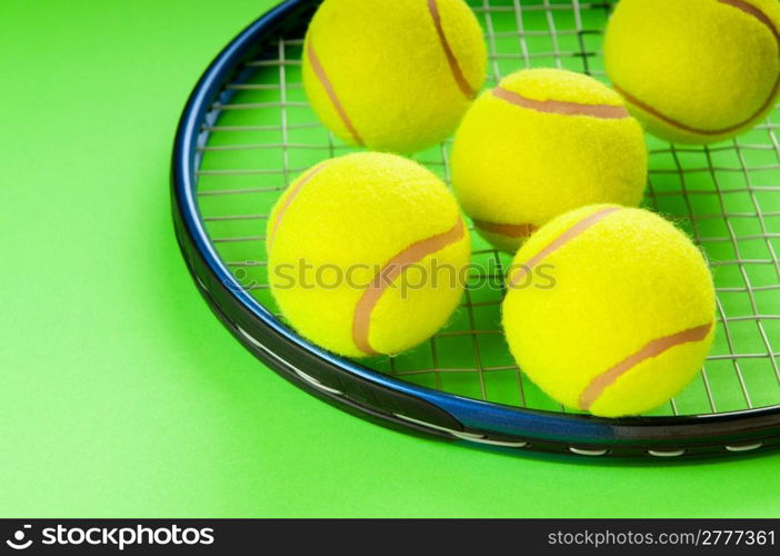 Tennis concept with balls and racket