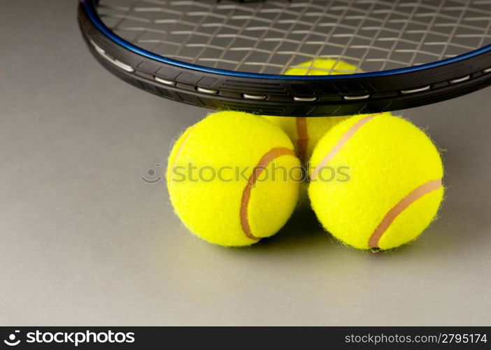 Tennis concept with balls and racket