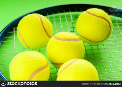 Tennis concept with balls and racket