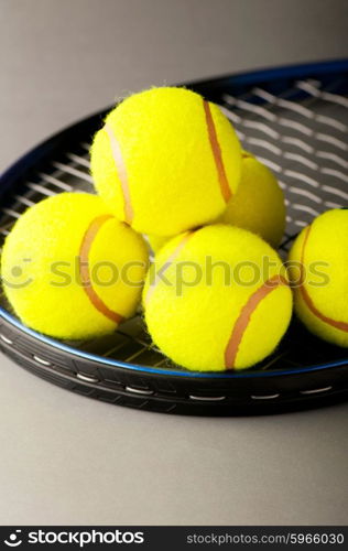 Tennis concept with balls and racket