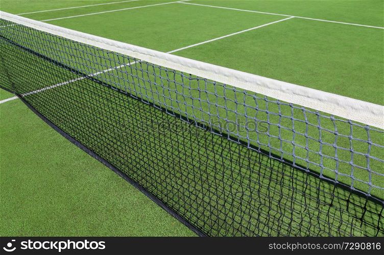 Tennis court with green artificial grass.. Tennis court with green artificial grass