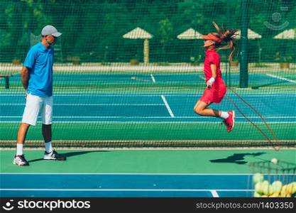 Tennis girl jumping rope