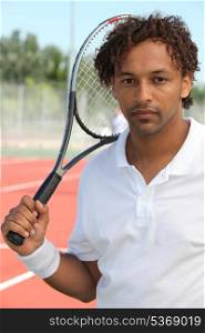 Tennis player holding racket