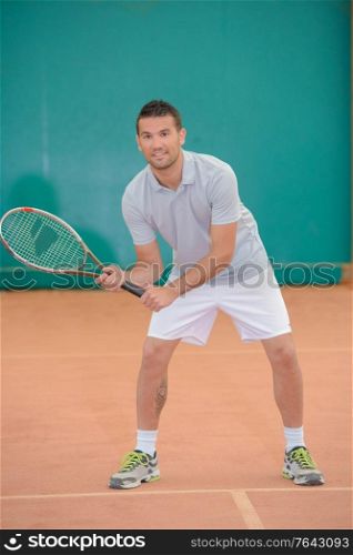 tennis player preparing to play