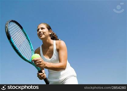 Tennis Player Preparing to Serve