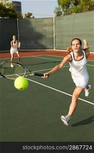 Tennis Player Reaching For Ball
