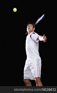 Tennis player ready to hit ball, portrait