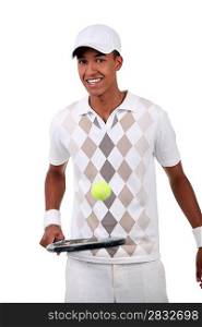 Tennis player with racket
