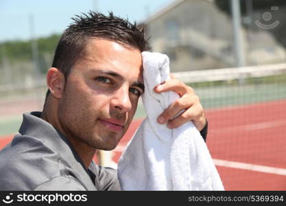 tennis player with towel