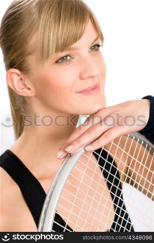 Tennis player woman young smiling leaning on racket isolated