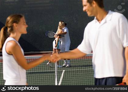 Tennis Players Shaking Hands at Net