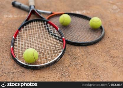 tennis rackets with balls court