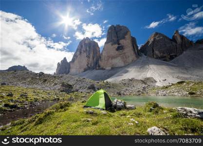 Tent at the Alpine mountains landscape