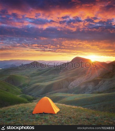 Tent in mountain. Hiking and nature composition.