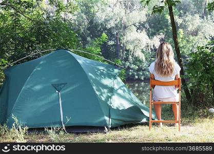 Tent in summer forest