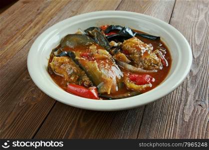 Tepsi Baytinijan- popular Iraqi casserole .dish is aubergine,baking dish, accompanied with meatballs, tomatoes, onions and garlic.