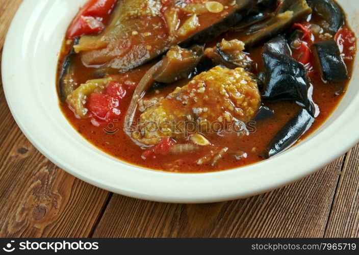 Tepsi Baytinijan- popular Iraqi casserole .dish is aubergine,baking dish, accompanied with meatballs, tomatoes, onions and garlic.