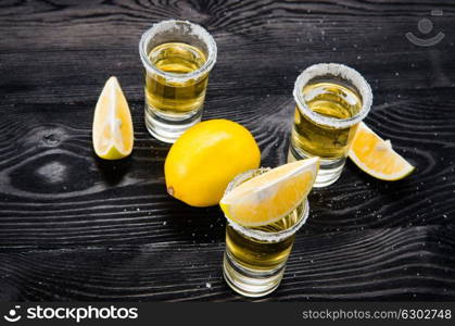 Tequila drink served in glasses with lime and salt