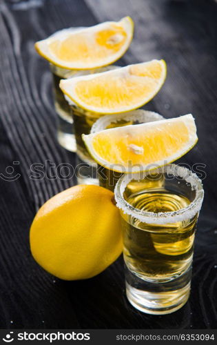 Tequila drink served in glasses with lime and salt