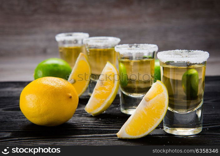 Tequila drink served in glasses with lime and salt